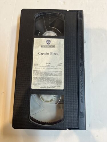 Captain Blood (VHS 2001)  Errol Flynn • Olivia De Havilland | Warner Bros